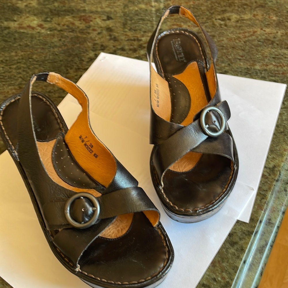 Black sandals by Born.